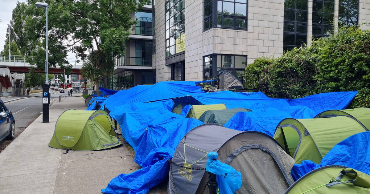 ‘This is not a good view for people’: homeless asylum seekers soaked during weekend rain