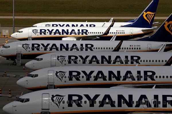 Ryanair warns of €450m losses as Omicron sparks tighter travel curbs