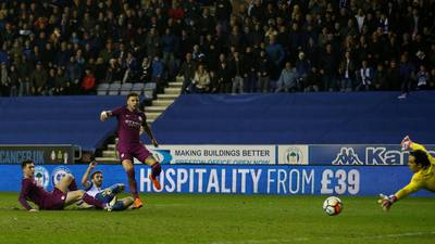 Will Grigg fires Wigan past Man City and into FA Cup quarter-finals