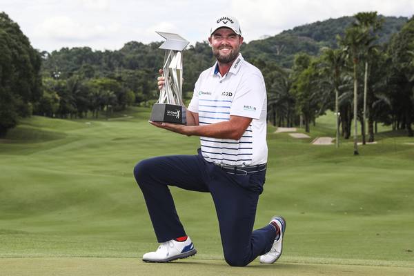 Marc Leishman eases to five shot victory in Kuala Lumpur