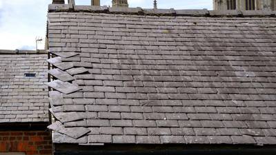 Tiles are blowing off roofs in our estate. Do  we have any recourse?