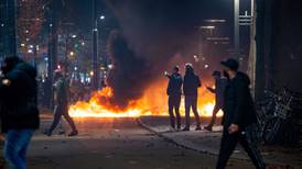 Who were the rioters who smashed through Rotterdam and The Hague?