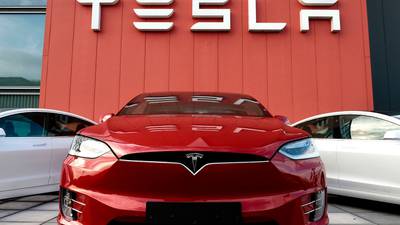 Tesla shares soar 21% on surprise quarterly profit