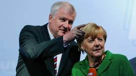 Merkel fights for majority in tight German election race