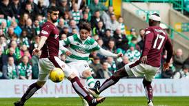 Celtic go seven points clear at SPL summit with Hearts win