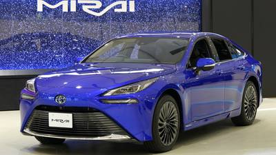 Toyota unveils improved version of hydrogen car Mirai