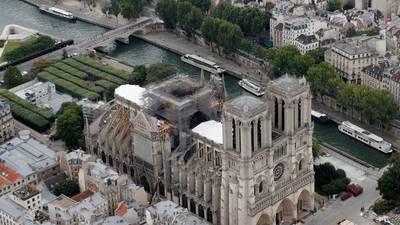 Work on Notre Dame halted and schools shut as toxic  lead found near stricken monument