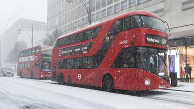 Four dead as snowfall sweeps across Britain