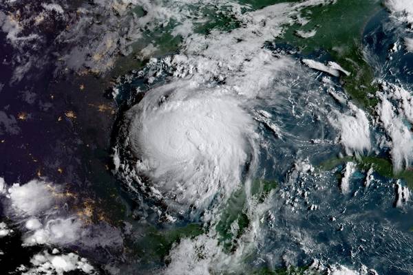 Hurricane Harvey: Residents flee Texas coast ahead of powerful storm