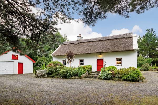 Escape to this gorgeous thatched fishing lodge on the shores of Lough Conn for €285k