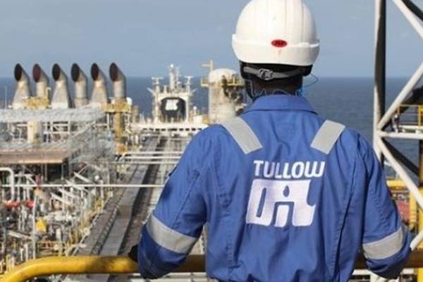 Tullow Oil downgrades output guidance again as it restores dividend