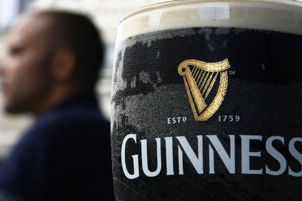 Diageo sees double digit sales growth in first half, shares hit record high
