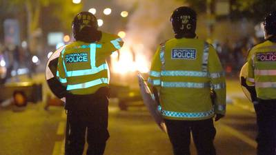 Six police officers injured during clashes with protesters in London