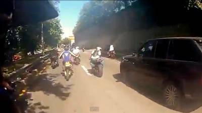 Two bikers charged over beating of driver in NY chase incident