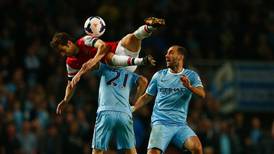 Arsenal recover pride but City  maintain title momentum
