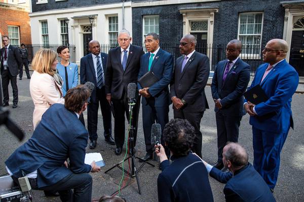 Theresa May apologises to Caribbean leaders over treatment of immigrants