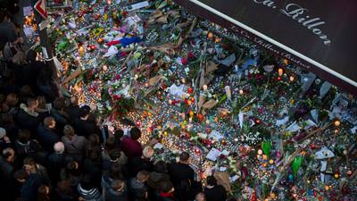 Paris remains defiant even as it mourns victims