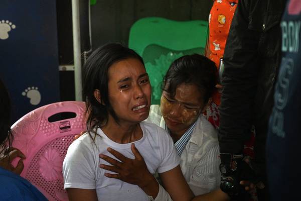 Myanmar junta accuses Suu Kyi of taking bribes as 12 protesters killed