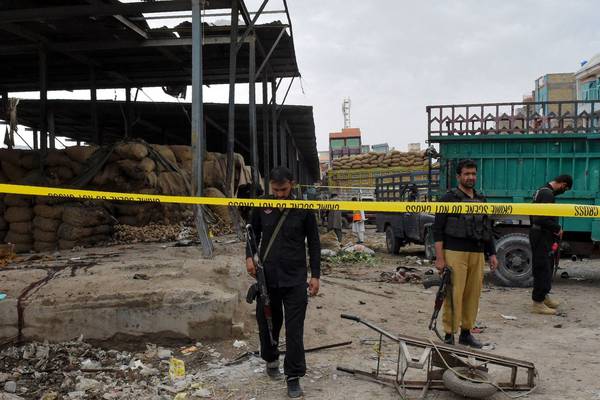 At least 18 killed in suicide bomb attack on market in Pakistan