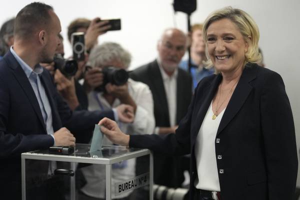 Far-right National Party leading in first round of French parliamentary elections, exit polls show