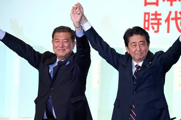 Abe re-elected as party leader paving way to become longest serving PM