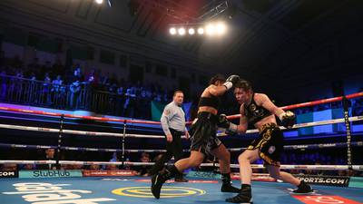 Katie Taylor goes the distance in successfully defending world title