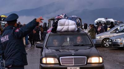 ‘To me, my house no longer exists’: Armenians flee Nagorno-Karabakh after Azerbaijan’s assault