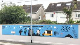 Roddy Doyle unveils Kilbarrack Dart murals