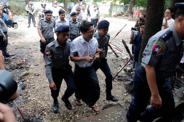 Myanmar court jails two Reuters journalists for seven years