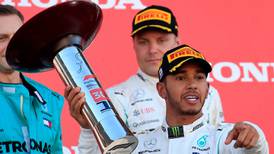 Japan win puts Lewis Hamilton on verge of world title