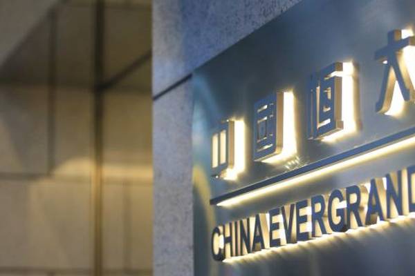Evergrande shares rise as it names state firm official to board
