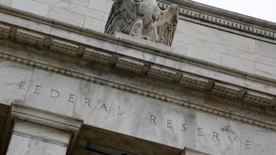 Fed leaves door open on asset tapering