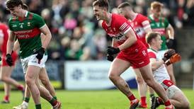 Derry withstand late Mayo rally to go back top of Division One