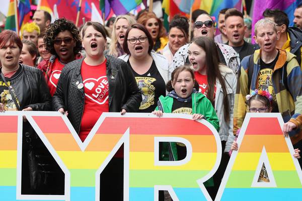 Placard remembering Lyra McKee carried at rally for marriage equality