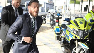 Conor McGregor appears in court charged with assaulting a man