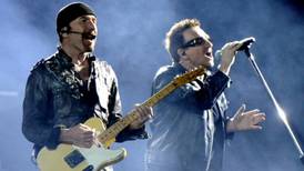 Guitar-maker Fender seeks cutting Edge from U2 frontmen