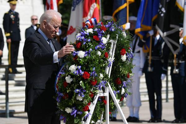 Biden warns US democracy ‘in peril’ as he commemorates war dead