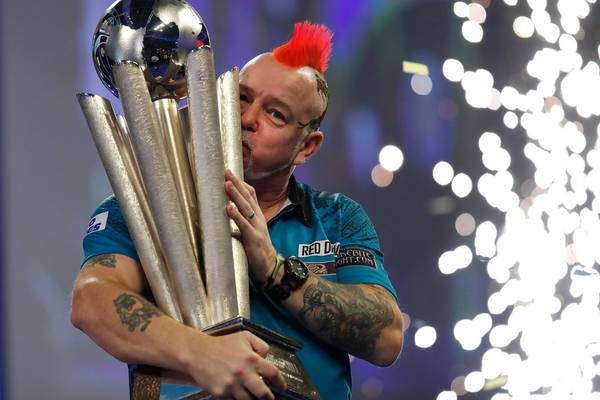 Peter Wright breaks Michael Smith’s resistance and heart to win world title
