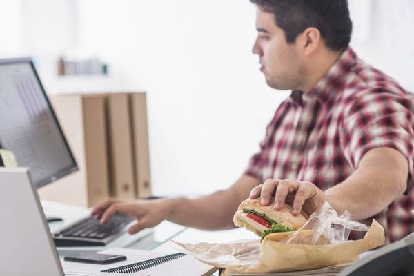 Why eating at your desk is a health risk