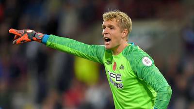 Everton sign Huddersfield goalkeeper Jonas Lossl on three-year deal
