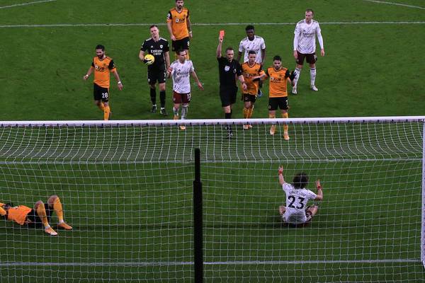 Wolves steady the ship with comeback win over nine-man Arsenal