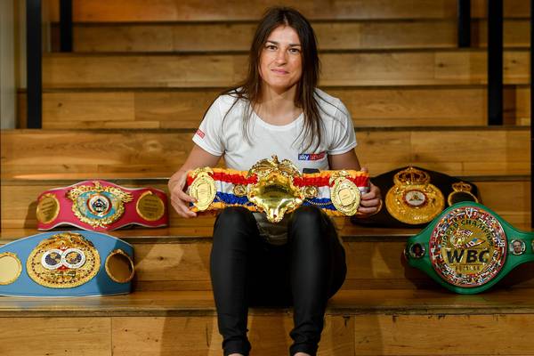 Katie Taylor happily taking some time out after world title win