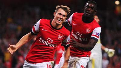 Ramsey’s double puts Arsenal through to group stages