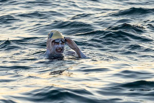 Cancer survivor is first to swim across English Channel four times non-stop