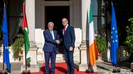 Israel treats Palestinians ‘in a way that is unacceptable and illegal’, says Coveney