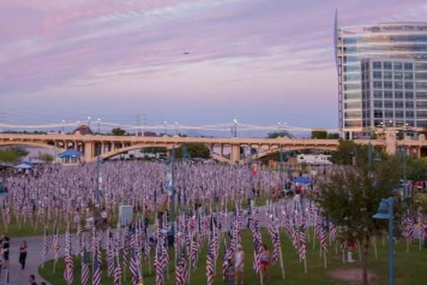 Saying the names of the 2,996 who died on 9/11, we remember them