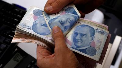 Turkish lira crashes to record low on worries over economy