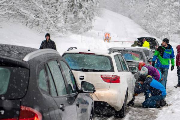 Days of snowfall have cut off Austrian and German towns from the outside world
