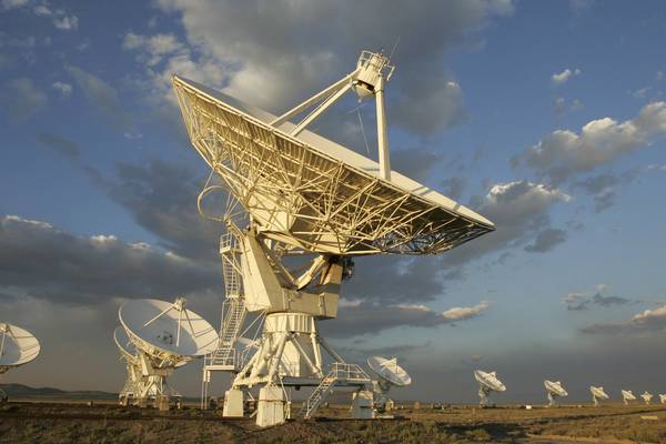Mysterious radio waves traced to distant galaxy