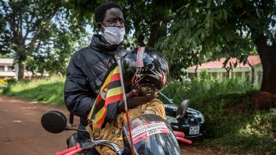 Activist crosses Uganda on a motorbike to deliver suncream to people with albinism